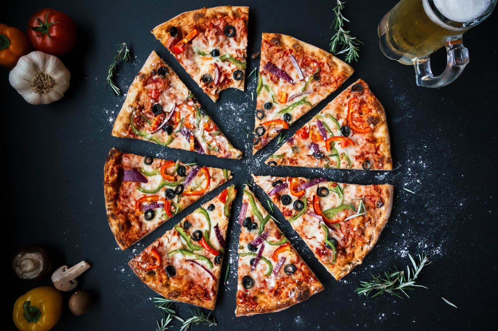 overhead view of a pizza cut into slices