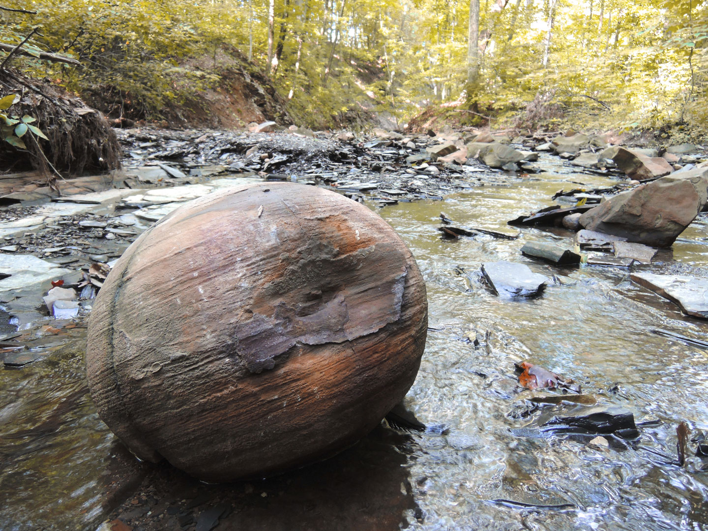 large rock formations in a river