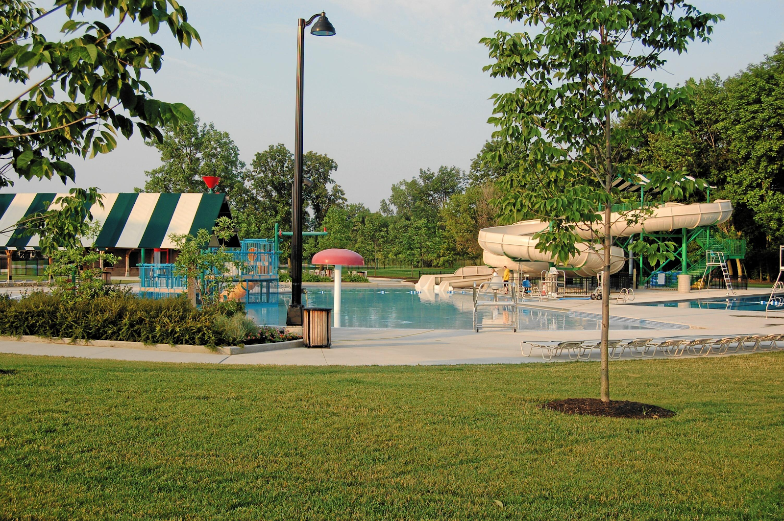 a nice pool with a large slide