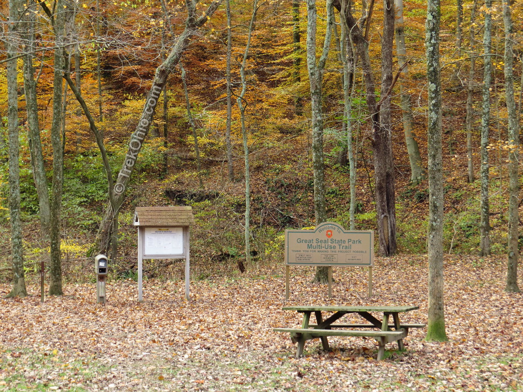 Great Seal State Park sign and picnic table in front of trees with autumn leaves