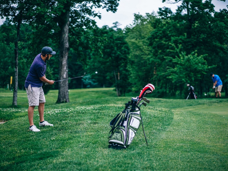 man golfing