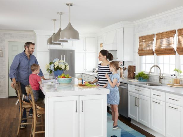 A family gathered around the island in their kitchen