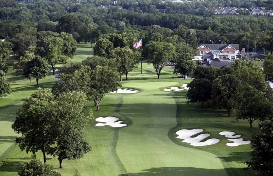 aerial shot of golf course with sand traps