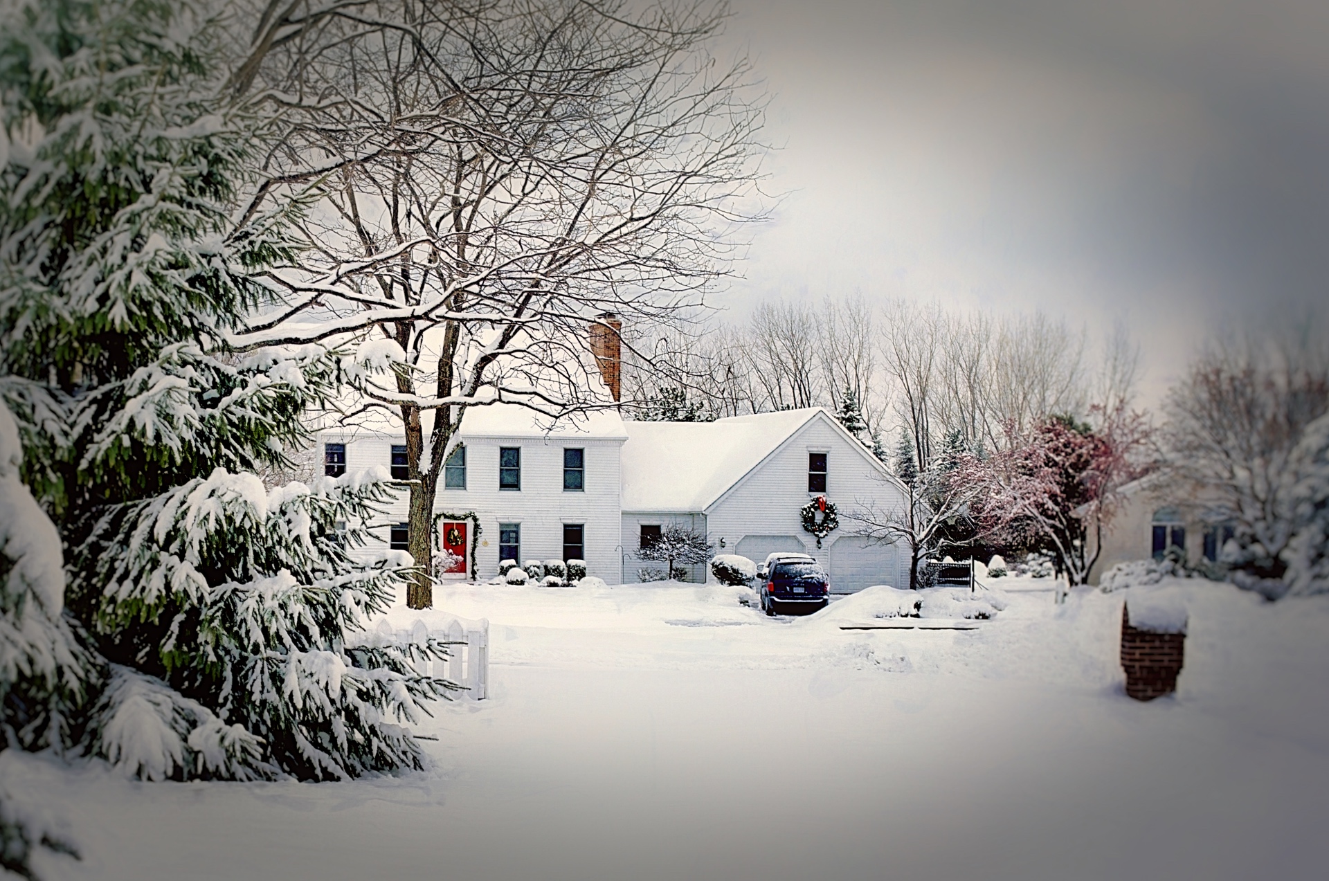 a home dusted in snow