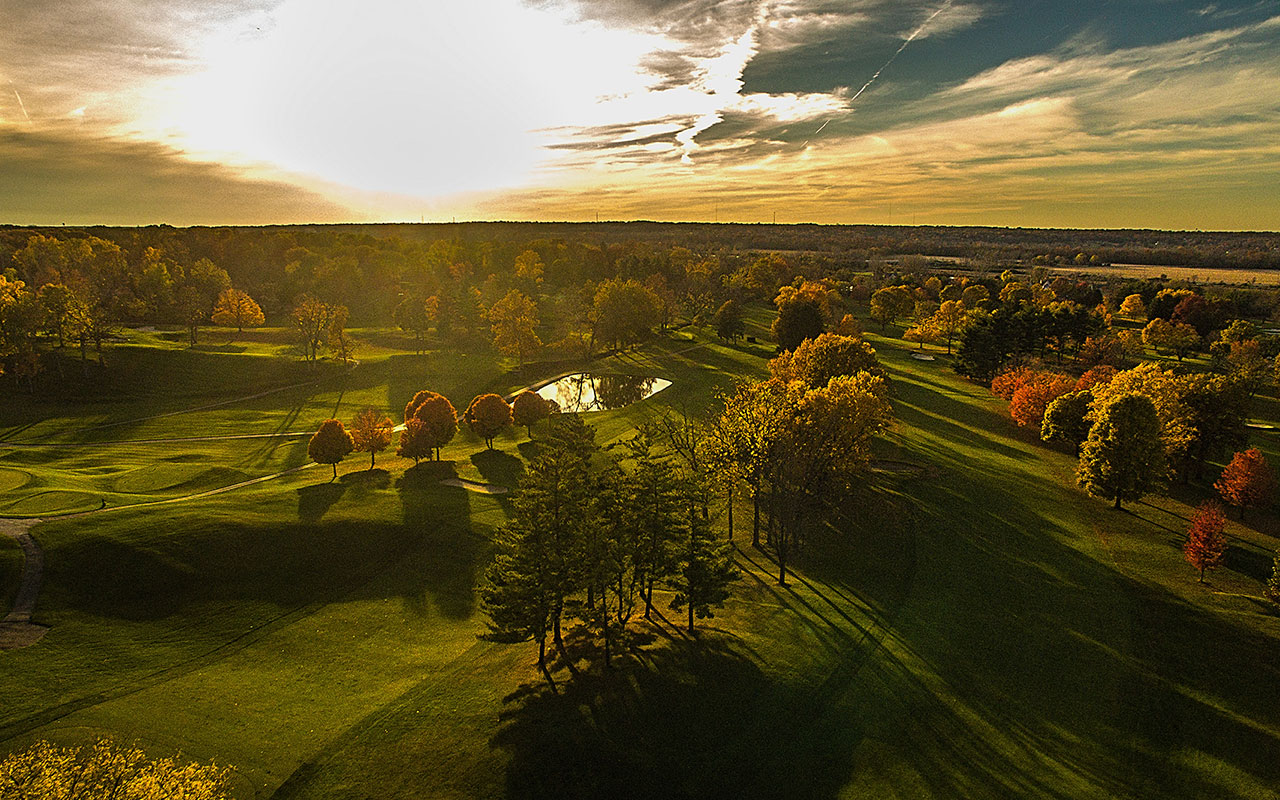 sunset over the grassy fields surrounding springfield, ohio