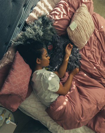 Woman lying in bed