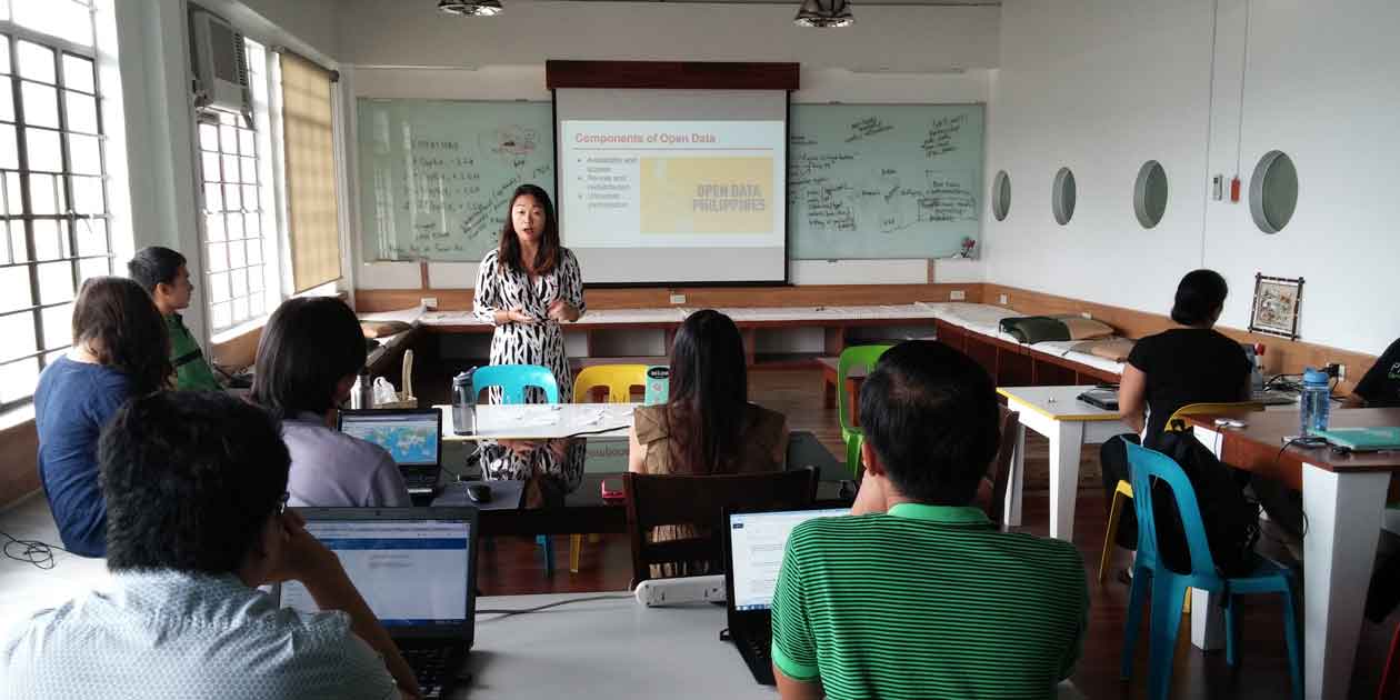 AidData Summer Fellow Amy Leung gives a training on OpenStreetMap at ANSA-EAP. Photo by AidData, all rights reserved.