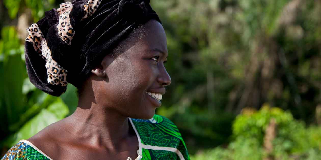 Martha Togdbba of Kpaytno, Liberia, grows vegetables, including tomatoes and chili peppers. Photo by Laura Elizabeth Pohl and Bread for the World, licensed under CC BY-NC-ND 2.0.