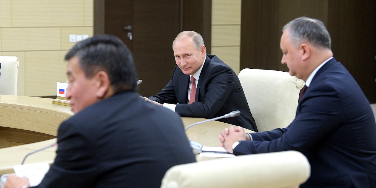 Russia’s President Vladimir Putin (center) and Kyrgyzstan’s President Sooronbay Jeenbekov (left) at an informal meeting of the heads of the Commonwealth of Independent States in December 2017. Kyrgyzstan is the #1 recipient of Russian foreign aid. Photo by the Office of the President of Russia, licensed under (CC by 4.0).