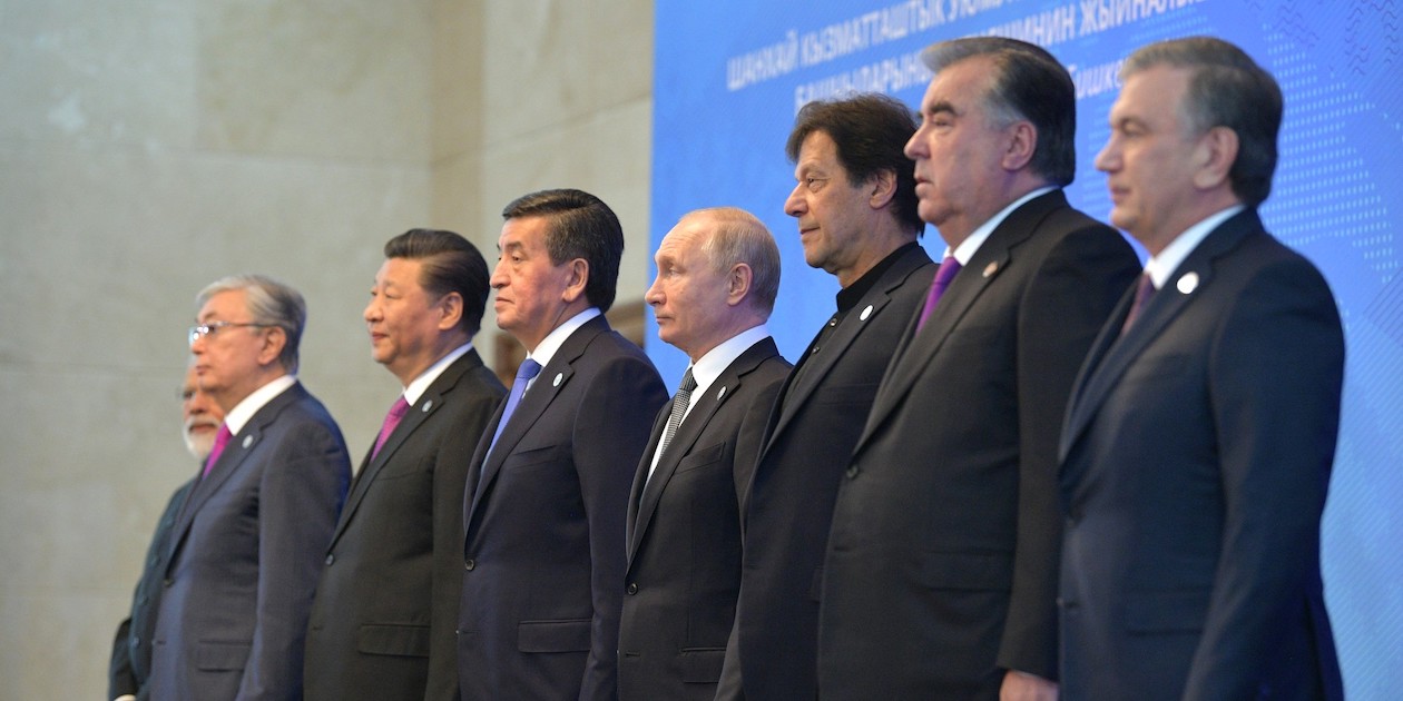 The leaders of the Shanghai Cooperation Organization member states (China, India, Kazakhstan, Kyrgyzstan, Pakistan, Russia, Tajikistan and Uzbekistan) take part in a photo session before the 2019 SCO summit. Photo from the Office of the President of Russia, in the public domain.