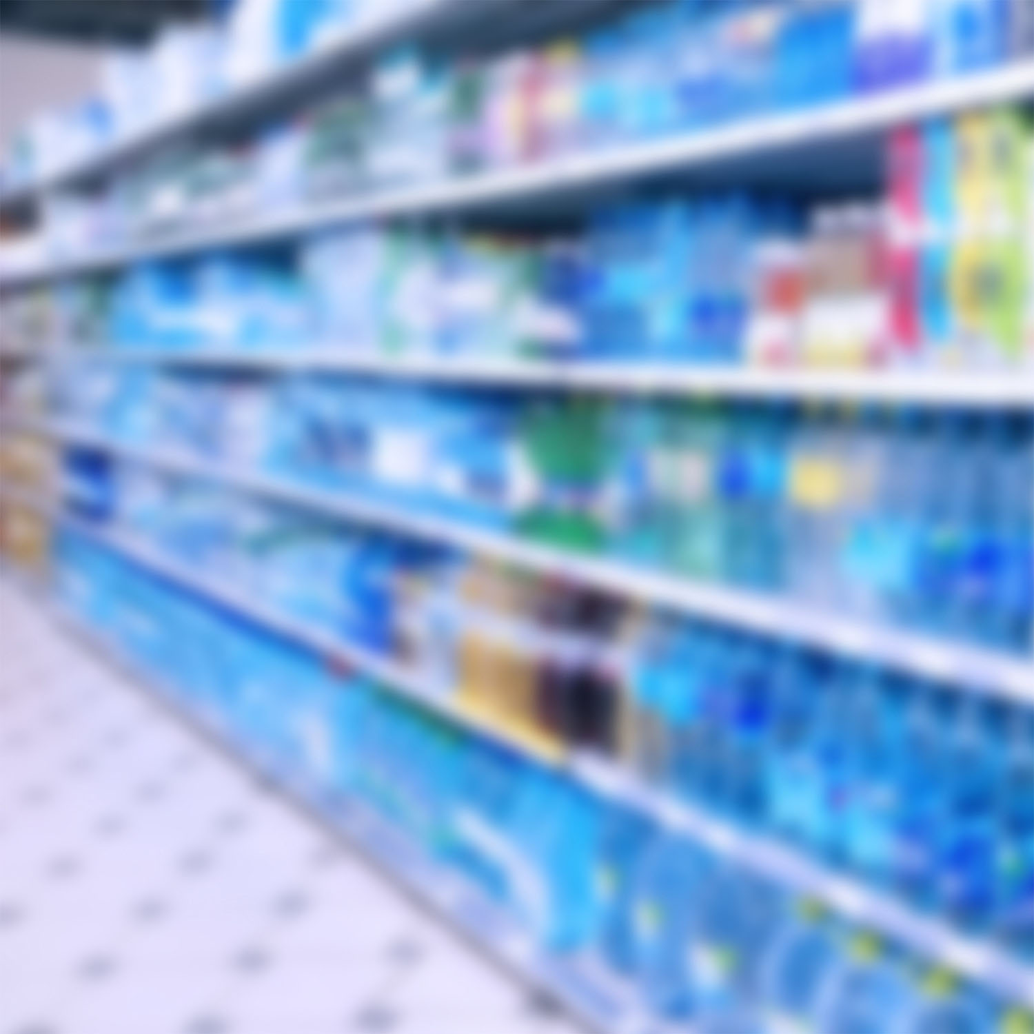 Small plastic toy hockey player with full-size puck