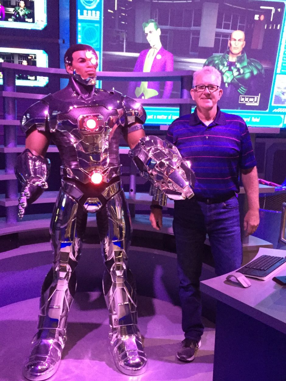 John Salisbury standing with his 5th Cyborg creation.