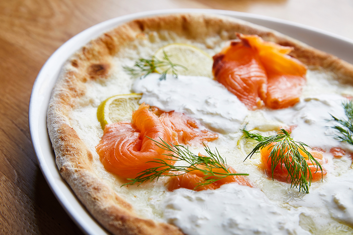 Pizza with Smoked Mozzarella di Bufala, Stracciatella from Puglia, Smoked Wild Salmon, Lemon and Dill