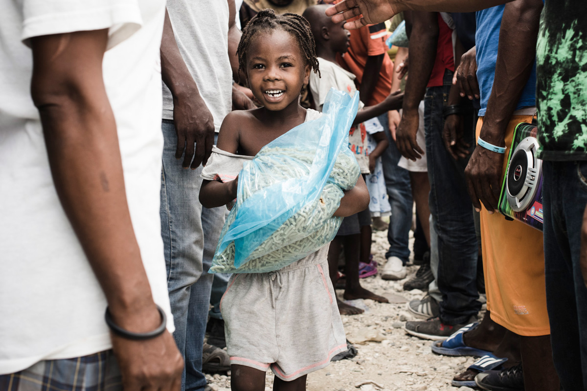 Charity for NPH Italia Onlus - Distribution of Pasta in Haiti