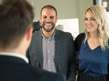 Image of business accountants talking to clients