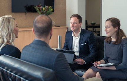 Image of a team discussing financial advice