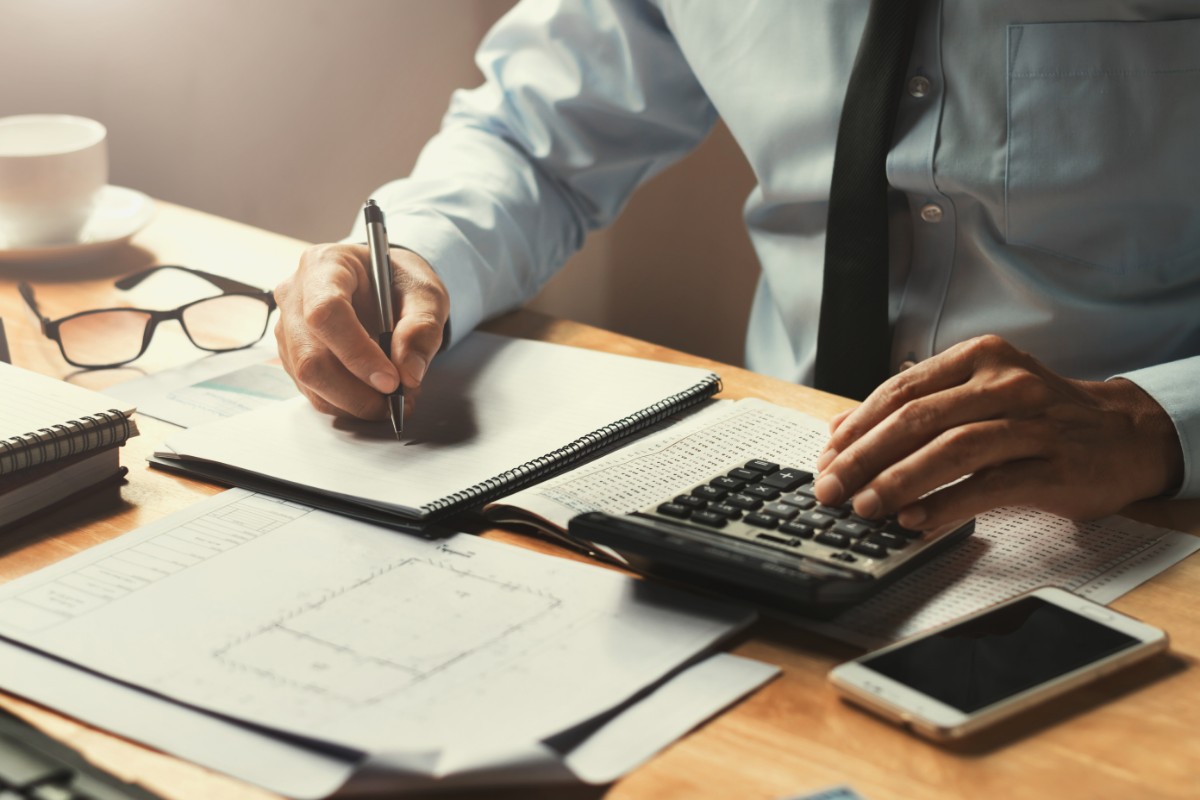 Man calculating his tax