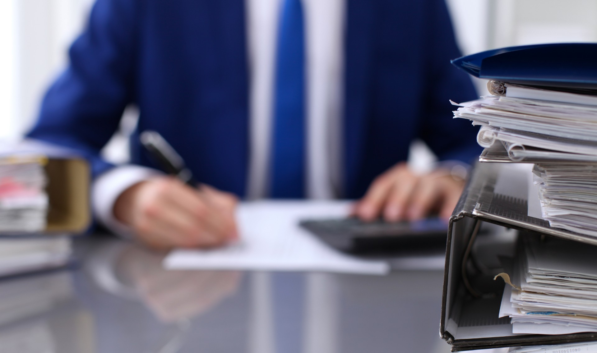 man completing tax planning