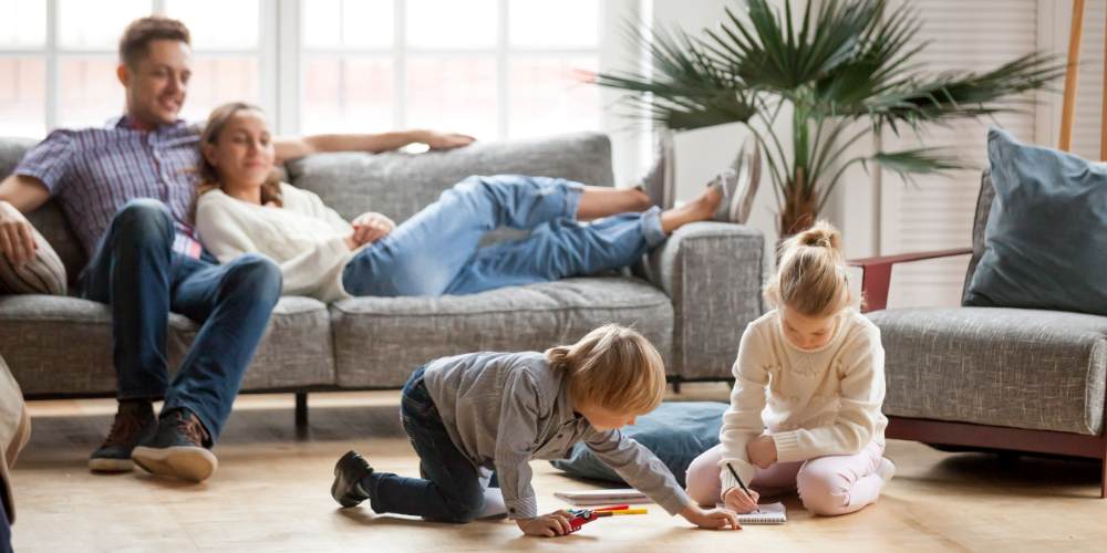 Family in home children playing