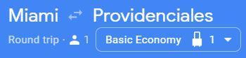 google flights shows the class of fare when booking