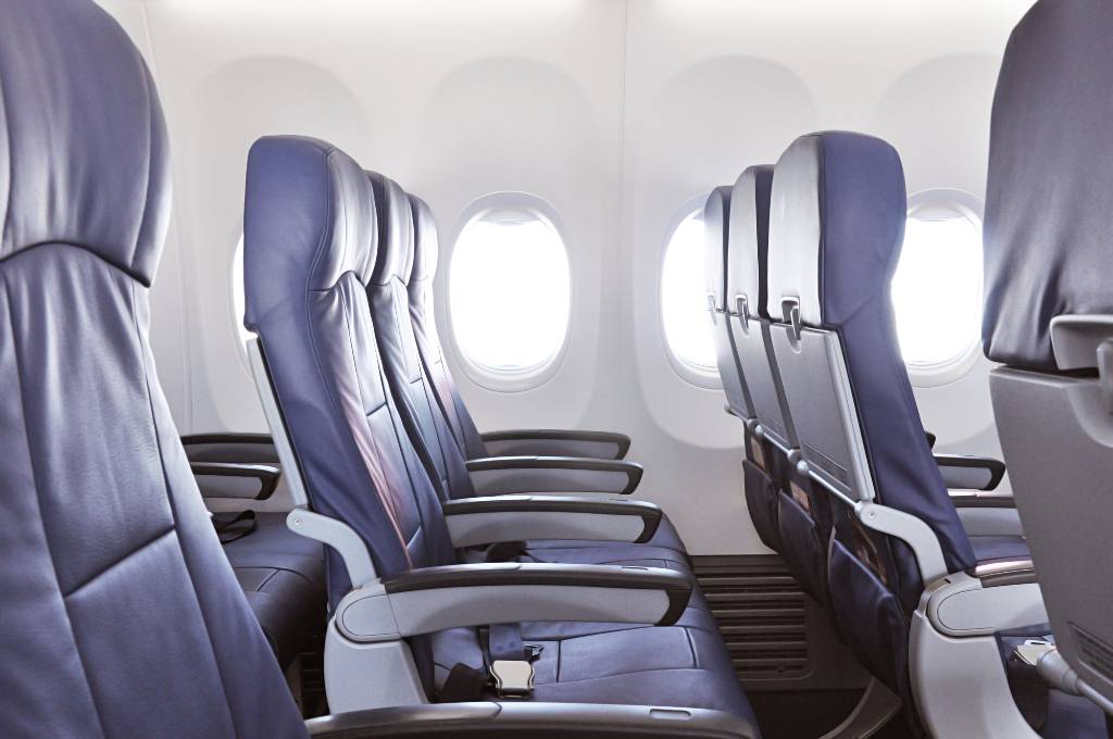 empty row of seats on a plane