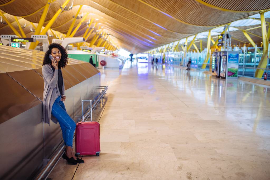 traveler with carryon bag