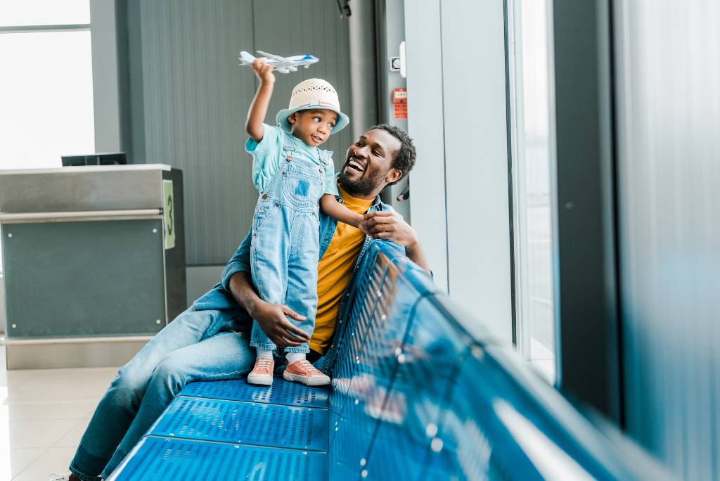 father and child at the airport