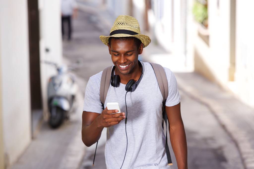 traveler looking at his phone
