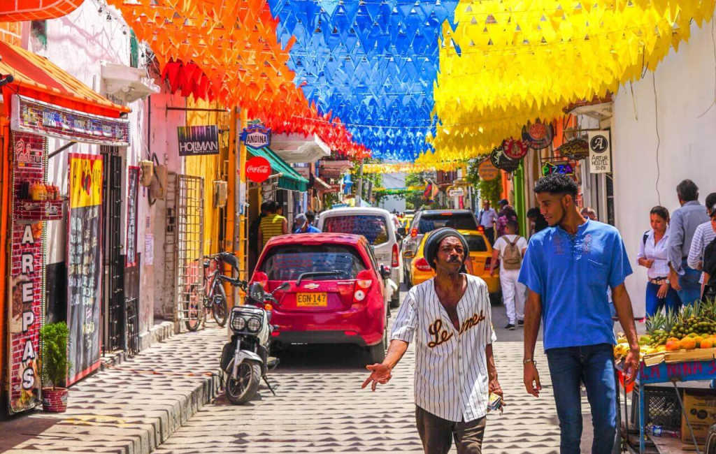 people walking down street in Cartgena