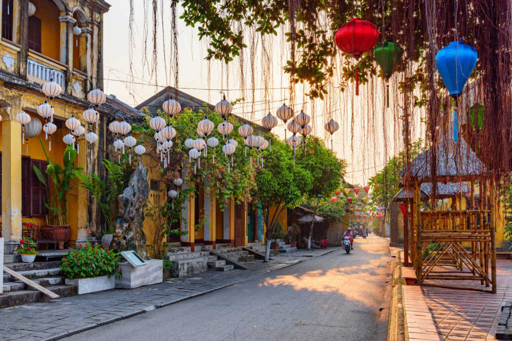 lanterns hanging above the street in Hoi An.