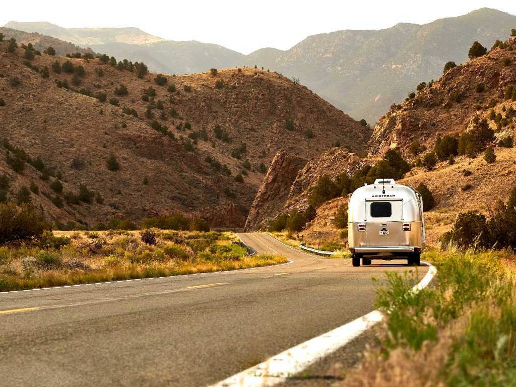 rv driving down a .mountain road