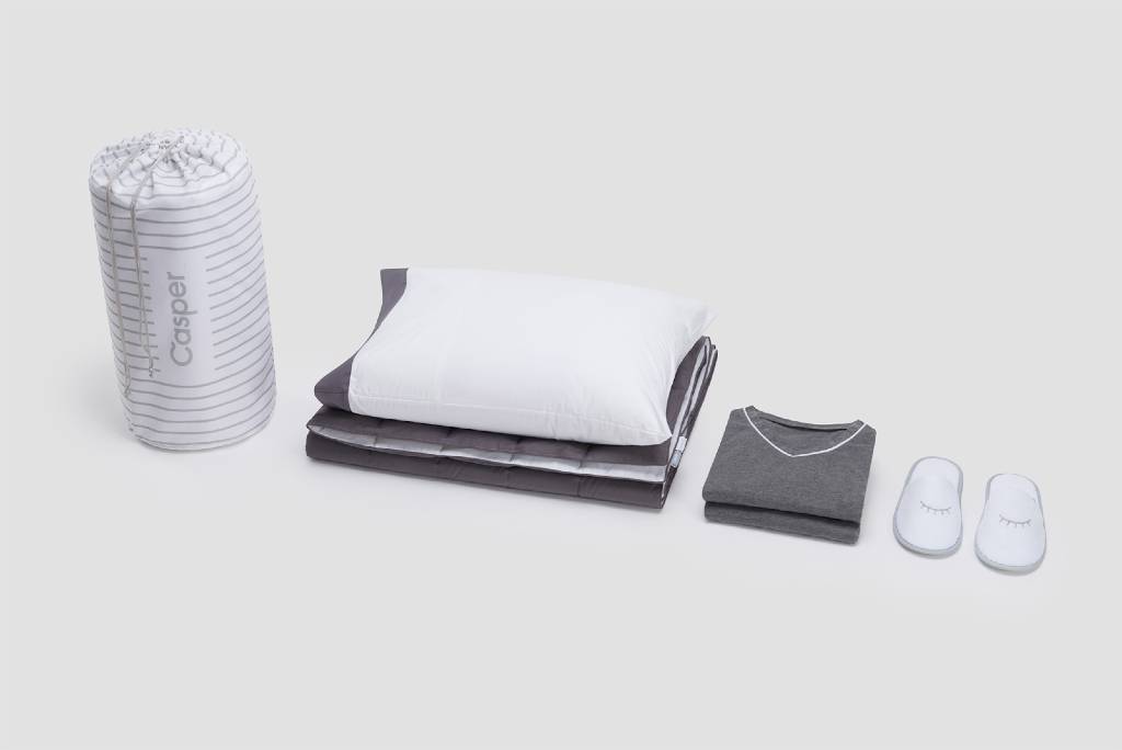AA business amenity kits on flights to AUS, NZ, and Hong Kong.