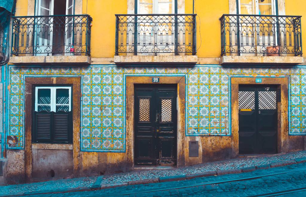mosaic tiles on houses in Lisbon.