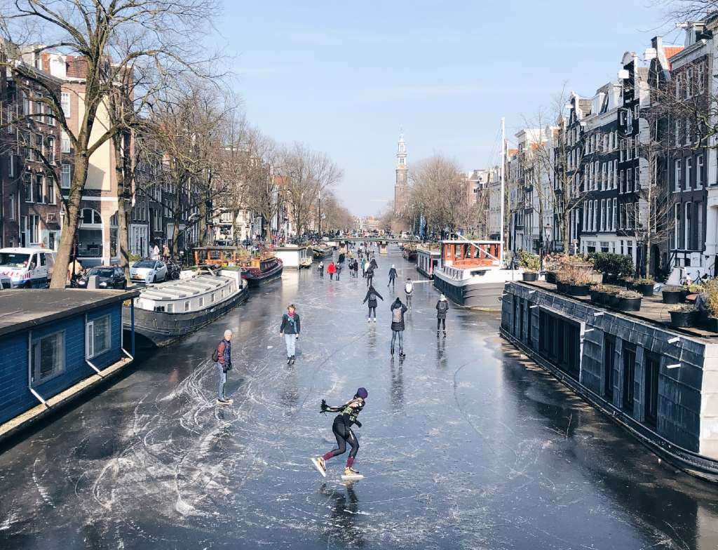 ice skating on a frozen canal in Amsterdam.
