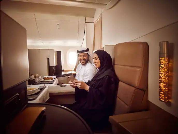 couple in business class on Etihad.