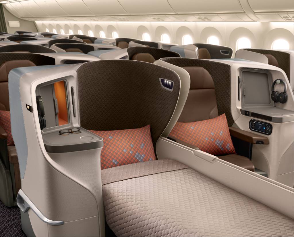 Singapore Airlines business class seat lie flat.