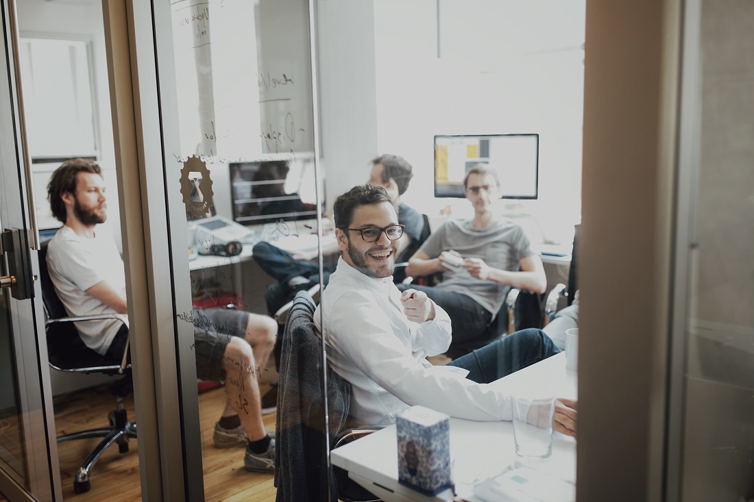 Group of Entrepreneurs Striving in Work Space