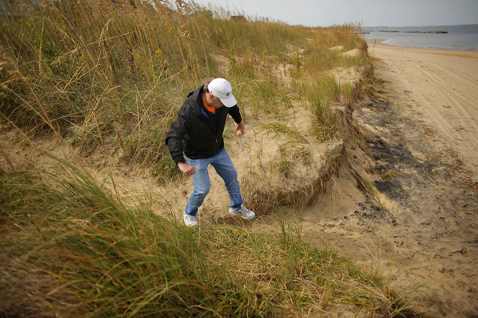 Coastal News Today VA High tide at East Beach reaches the dunes