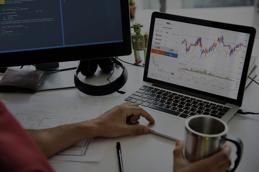 expert-looking-into-monitoring-charts-on-laptop