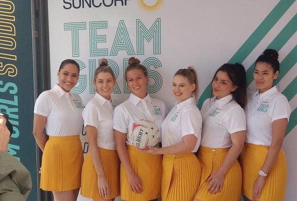 girls posing for photo at custom event