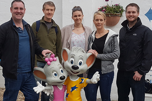 Group photo of the Fred.\ Holidays team at Europa-Park