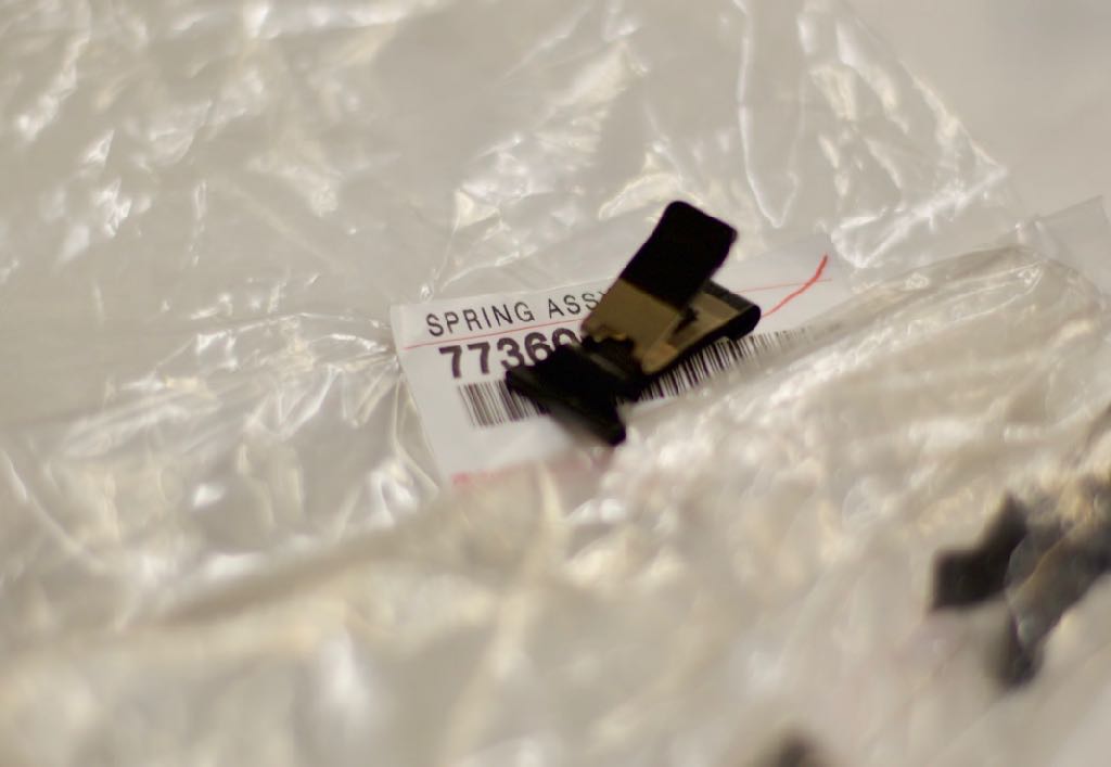 Delta Vehicle Systems Toyota OEM fuel door spring