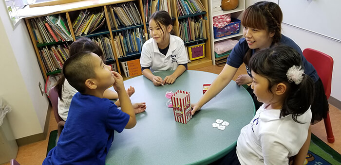 Students learning with their teacher