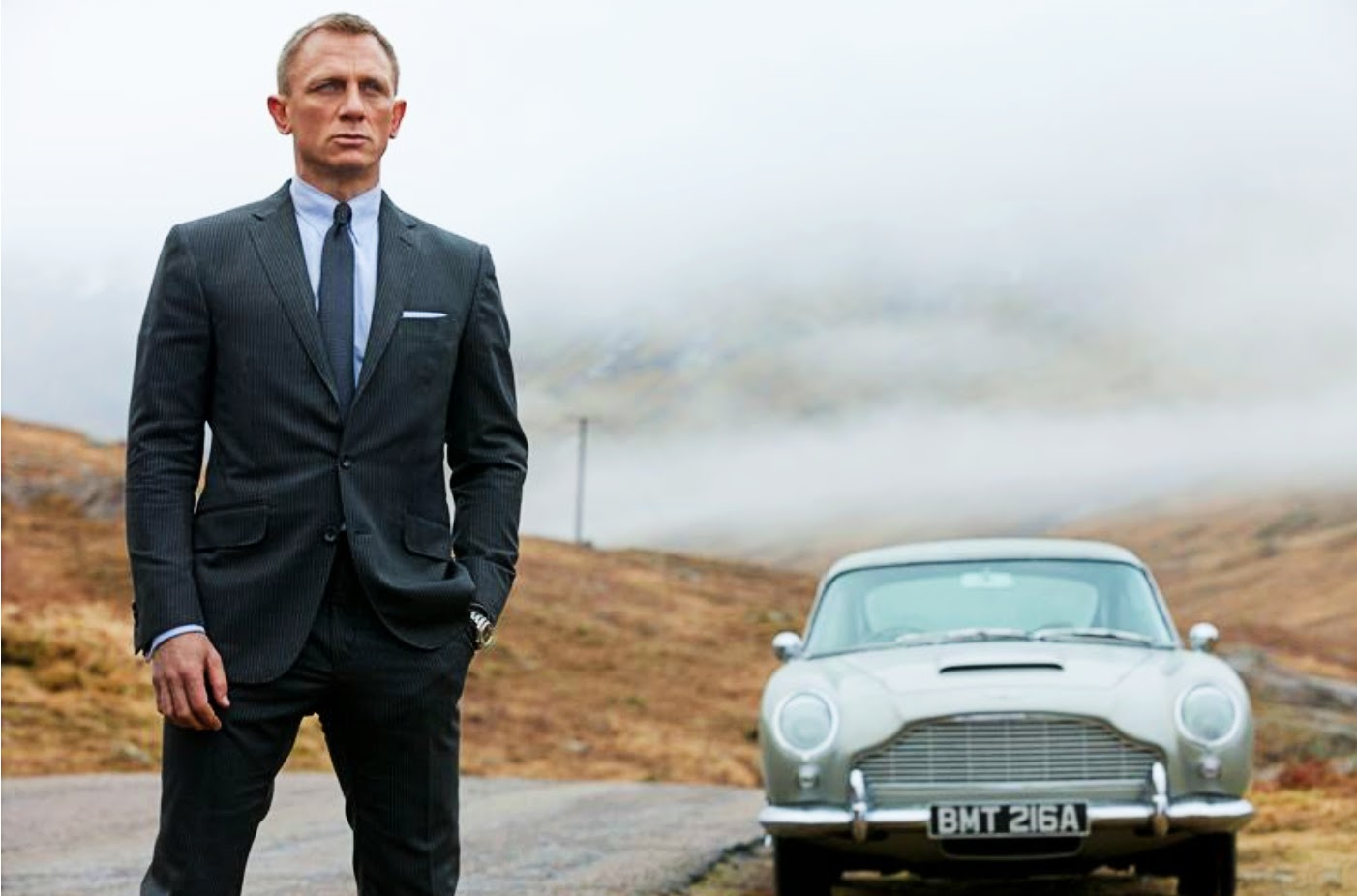 Daniel Craig with his DB5 in Skyfall