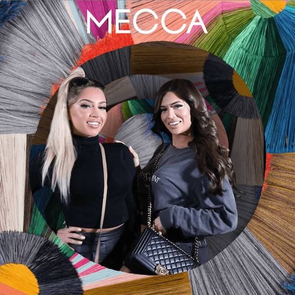 girls posing for photo social playground event