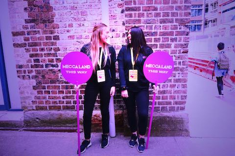 event staff posing at social playground event