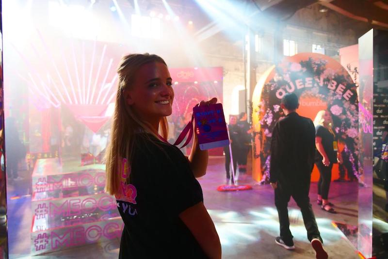 event staff taking photo at social playground event activation