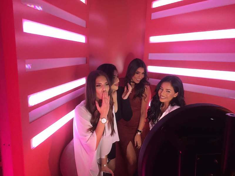 event staff using gif booth at event activation