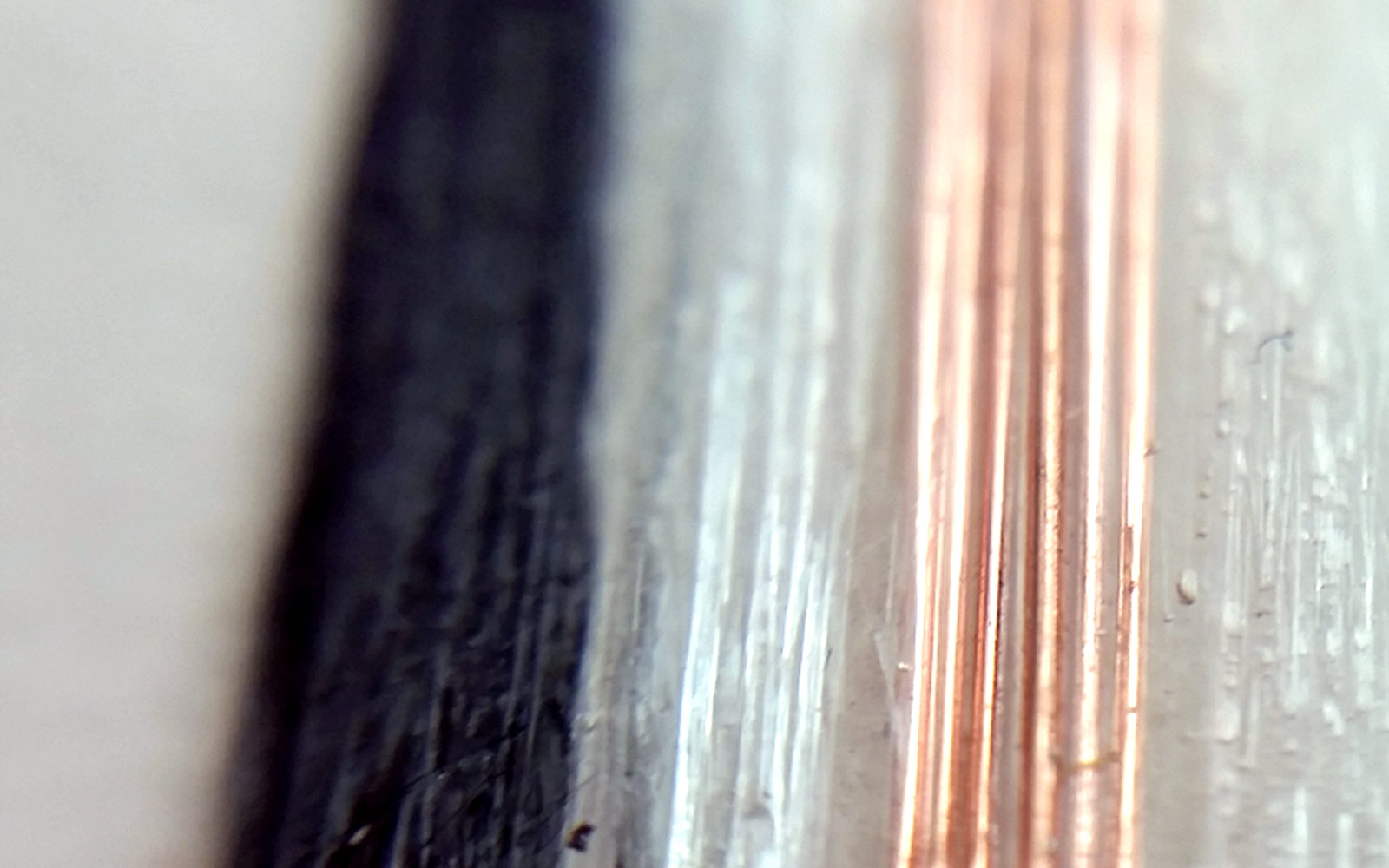 Fiberglass and copper wire print. Also print of carbon fiber.