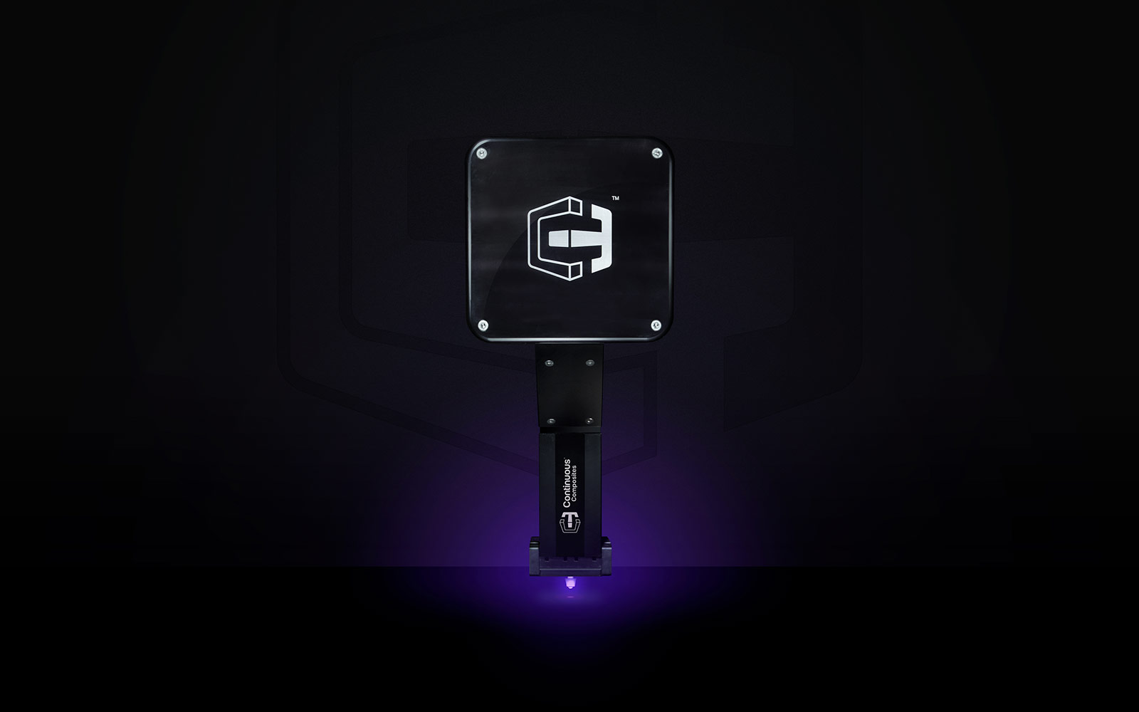 Print head ghosted in dark background with UV light glowing.